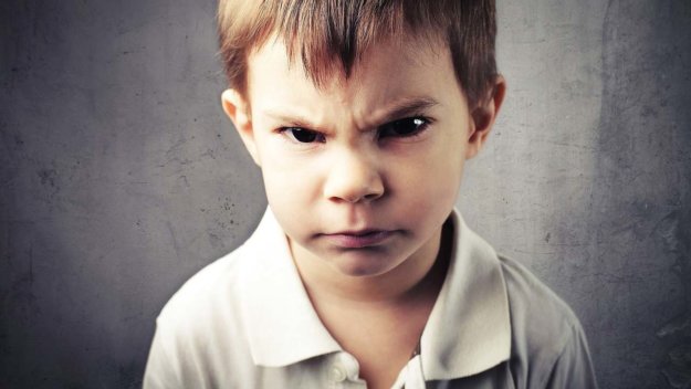 little boy is annoyed with planned ignoring