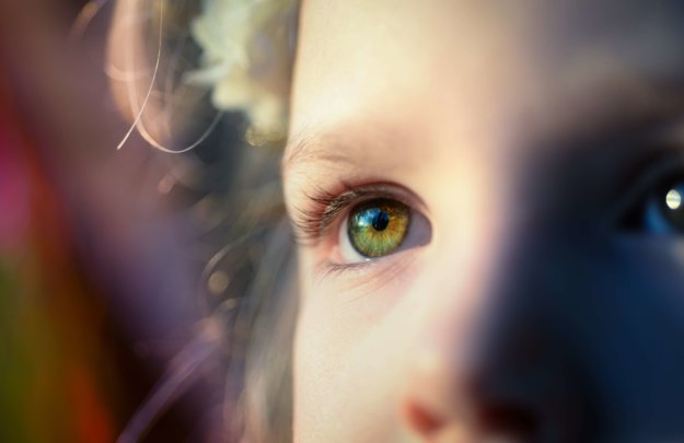 close up of little girls eye who wonders what is asd